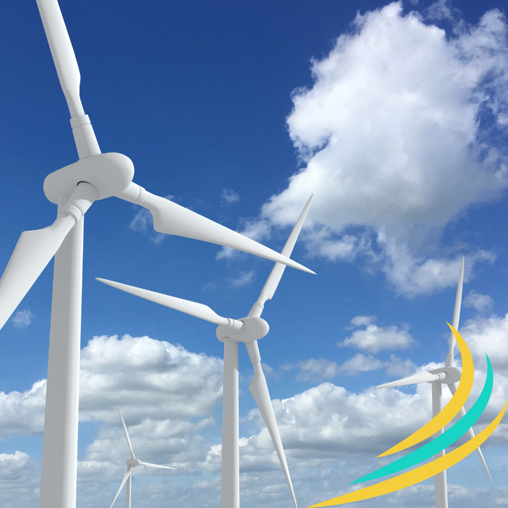 Image of wind turbines and a blue sky with clouds